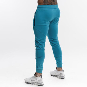 Pantalones para correr de gimnasio para hombre con bolsillos, ropa deportiva informal de talla grande de alta calidad para entrenamiento físico, venta al por mayor - Product Image 3
