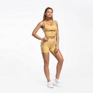 Soutien-gorge de sport anti-cellulite croisé dans le dos pour femme, personnalisé, rembourré, couleur unie, en Spandex/Polyester, maintien moyen, vente en gros - Product Image 2