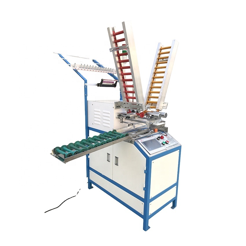 Weft winding machine for winding the yarn on the spool