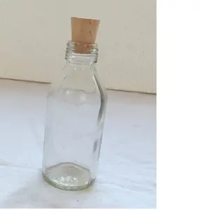 custom made empty glass bottles with cork available in size 5 inches suitable for use as wedding invitations