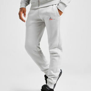 กางเกงวอร์มใส่วิ่งสำหรับผู้ชาย,กระเป๋าด้านหน้าทรงสลิมฟิตพร้อมโลโก้ - Product Image 1