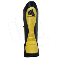Protections de tibia de boxe de haute qualité en cuir et éponge, design confortable et durable, protection professionnelle pour l'entraînement MMA