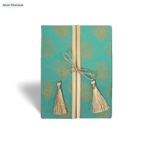 Journal de cahier en bambou attaché avec un cahier en tissu de coton à glands dorés pour un usage personnel et de voyage - Product Image 1