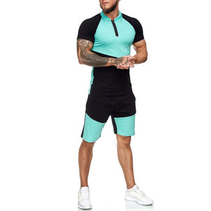 เสื้อโปโลแขนสั้นทรงหลวมสำหรับผู้ชาย,ชุดสองชิ้นกางเกงขาสั้นสำหรับวิ่งมีซิปสีตัดกัน - Product Image 2