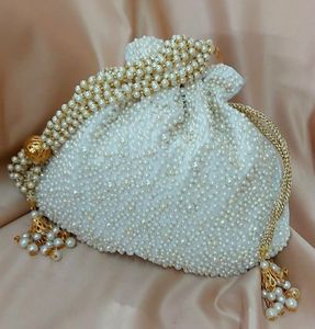 Stylish Silk Potli <b>Bag</b> with Zari Embroidery Work <b>for</b> Party & <b>Wedding</b> 2021 Design - Product Image 1