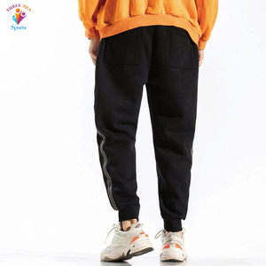 Pantalones de chándal Unisex de alta calidad para hombre, pantalones ajustados para correr informales, decoración bordada, cierre elástico de cintura media, ligeros - Product Image 4