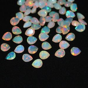 โอปอลเอธิโอเปียทรงลูกแพร์ขนาด 4x6 มม. ราคาส่งจากโรงงาน คุณภาพสูง พลอยโอปอลเวโลเอธิโอเปียแท้ - Product Image 1