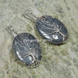 Colgante envuelto en alambre de plata de hematita, superventas - Product Image 1