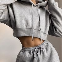 Siyah kırpma üst kadınlar moda seksi hoodie kazak pamuk iki parçalı Set kadın Hoodie katı kısa üstleri ve uzun