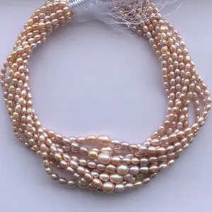 Bestseller natürliche rosa Roségold Farbe Süßwasser Perle Stein glatte Reisform Perlen von indischen Juwelier zum Großhandels preis