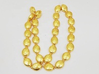 Perles ovales en cuivre gravées fantaisie plaquées or 14x10mm