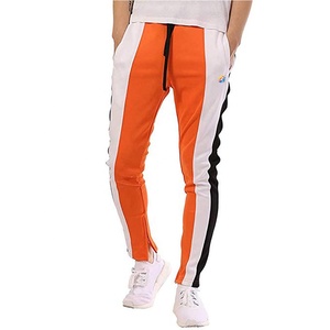 Prix de gros - Pantalons de survêtement en toile 100% coton pour hommes, couleur orange, imperméables et à séchage rapide, de la marque Formula1 Industries - Product Image 1