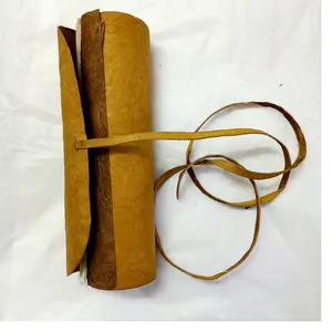 custom made scroll leather journals in golden yellow color with cotton papers