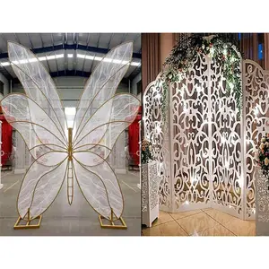 結婚式のステージのための新しい金属の背景結婚式のステージのための錬鉄製の蝶の背景高級結婚式のステージモネの背景