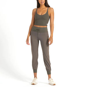 Joggers que absorben el sudor de alta calidad para mujer, ropa deportiva transpirable para entrenamientos de invierno con decoración de encaje, venta al por mayor - Product Image 1