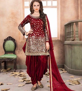 white christmas dresses Mustard Zardozi Embroidered Patiyala Suit main image 0