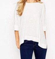 T-shirt décontracté pour femme 100 % polyester, écologique, coupe ample et confortable, col rond, ourlet asymétrique fendu, longueur allongée