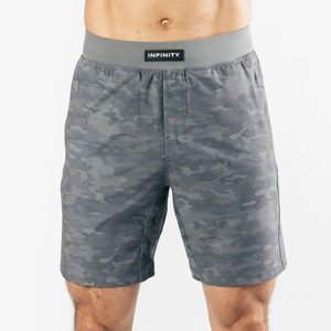 กางเกงขาสั้นออกกำลังกายผู้ชายรุ่นใหม่เอวสม็อคยืดได้ 4 ทิศทาง สีพื้น ผ้าแห้งเร็ว เหมาะสำหรับวิ่งและเล่นกีฬา - Product Image 1