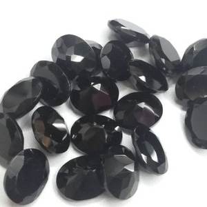 พลอยนิลดำธรรมชาติขนาด12มม. 14มม. อัญมณีเจียระไนทรงรีขนาด12มม. - Product Image 1