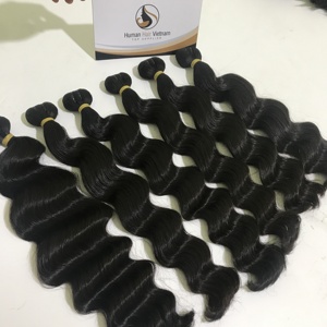 Cheveux humains Vietnam vente en gros pas cher longs doux 100% cheveux bruts vierges vague naturelle Extensions de cheveux humains cheveux ondulés trame faisceaux - Product Image 1