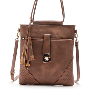 กระเป๋าสะพายข้างแบบวินเทจสำหรับผู้หญิงกระเป๋าทรงถังแบบลำลองมีพู่ซิปปิด - Product Image 1