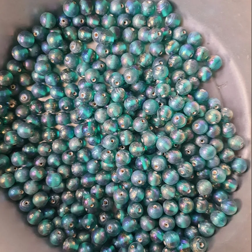 Perle di vetro a forma di tondo di colore verde fatto a mano in cristallo di perle in tutto il mondo