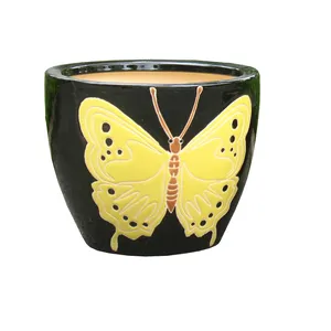 漂亮的蝴蝶设计室内玻璃花陶瓷罐陶瓷花盆种植树或纸花在桌面上