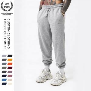 Pantalones de chándal tecnológicos informales para hombre, pantalones de chándal ajustados de poliéster y algodón liso con cintura elástica y logotipo personalizado, corte recto y rápido - Product Image 1