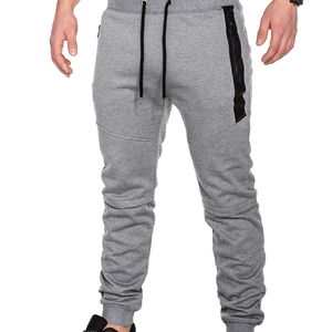 กางเกงวอร์มมีกระเป๋ามีซิปสีเทากางเกงวิ่งเข้ารูปผู้ชาย - Product Image 1