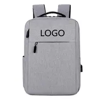 Toptan Logo özel dayanıklı iş seyahat su geçirmez gri Oxford okul çantası ucuz 15.6 inç öğrenci dizüstü bilgisayar sırt çantası USB
