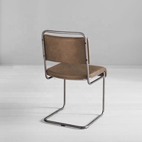 Chaise de salle à manger en cuir PU de style industriel moderne pour restaurant et café