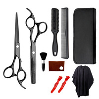 Ensemble de ciseaux de coiffeur professionnels en titane noir et or 2 pièces avec étiquettes et couleurs personnalisées