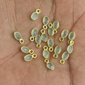 Gema de Calcedonia ovalada de 4x6mm, colgante con bisel dorado - Product Image 3