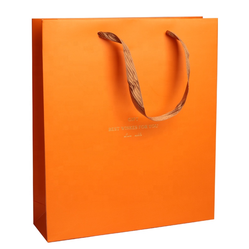 Custom luxury orange bronzing hand paper bag for clothing gift bag