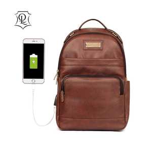 Sac à dos en cuir véritable avec logo personnalisé pour hommes sac à main étanche pour ordinateur portable sac à cordon caractéristique USB doublure décontractée en coton utilisation scolaire - Product Image 1