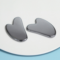 Pierre Terahertz en forme de coeur Gua Sha et outils de massage pour le drainage lymphatique, le soulagement des tensions et la relaxation du visage