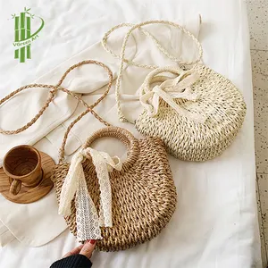 Bán Buôn Nhà Máy Việt Nam Handmade 100% Cỏ Biển Tự Nhiên Túi Rơm Cỏ Biển Nữ Tính Với Một Chiếc Nơ Xinh Xắn Túi Xách Tay Nữ