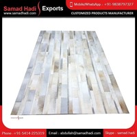 2024 Neueste Design Luxus bestickte Leder teppiche Hand gefertigt von Artisans Designer Hair On Cowhide Leather Carpet