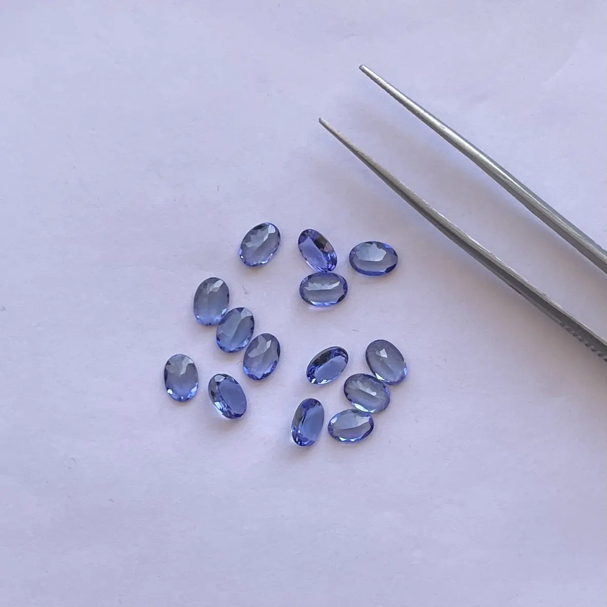 5x7mm Tanzanite alami potongan Oval faset longgar dikalibrasi grosir batu permata Semi mulia pemasok dengan harga pabrik Online