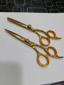 Ciseaux professionnels en acier inoxydable pour effiler les cheveux, avec vis réglable à 32 dents et repose-doigts, pour la texturisation et le mélange des mèches. - Product Image 4