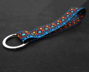 Porte-clés tendance avec cordon élastique, différents designs - Product Image 1