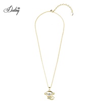 Pendentif singe mignon Daisini orné de cristaux Swarovski, argent 925 / laiton, collier animal du zodiaque chinois dansant