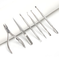 Kit d'outils de manucure FLYHIGH FH30 avec ensemble de manucure en acier inoxydable dans un étui en cuir noir et rouge, durable pour une utilisation personnelle