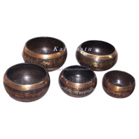 Mélangeur en métal en bronze sept cloche tibétaine avec support design en finition dorée antique article religieux
