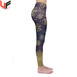 Pantalones deportivos de cintura alta con logotipo personalizado para mujer con mallas de tela suave de estilo punk con estampado de copos de nieve dorados - Product Image 2