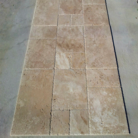 Collection 2025 Premium Select de parquet en travertin naturel de Versailles, motifs français, finition semi-mate, effet vieilli