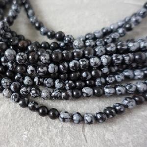 Hilo de cuentas de piedras preciosas redondas lisas de obsidiana de copo de nieve negro Natural de 4mm del fabricante a precio de distribuidor al por mayor calidad AAA - Product Image 1
