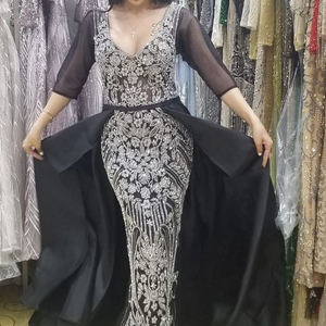 STYLISH LONG TRAIL EVENING DRESS EMBROIDERY OF DABKA, CRYSTAL GLASS BEADS,GLASS STONE WORK FOR PARTY-WEAR @ 2022 - Product Image 1