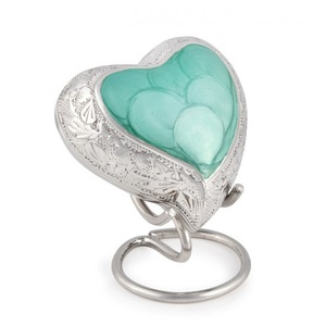 Urnas de cremación de recuerdos pequeños en forma de corazón metálico de alta calidad más vendidas para cenizas humanas/suministros funerarios - Product Image 1