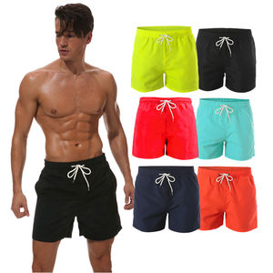 Pantalones cortos de gimnasio para hombre de poliéster 100% al por mayor ropa de entrenamiento al aire libre de playa informal transpirable de secado rápido calle sólida - Product Image 1